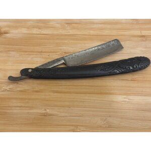 Vintage Straight Razor With Ornate Black Handle & Steel Blade